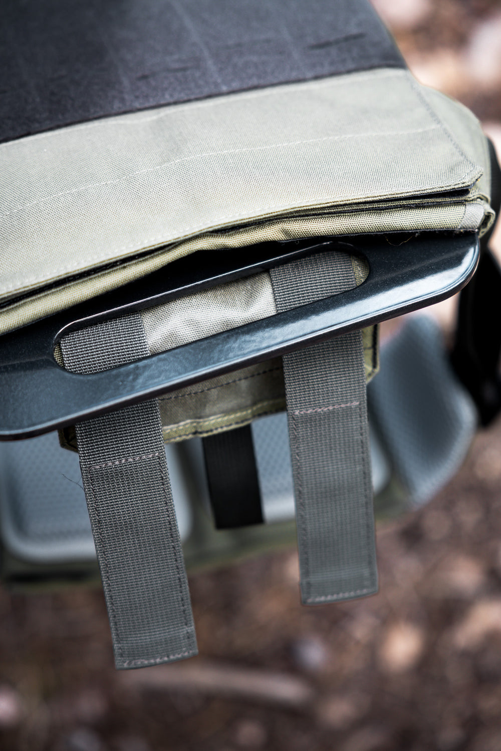 close up of the bottom handle on the Strata Weight Vest Plate