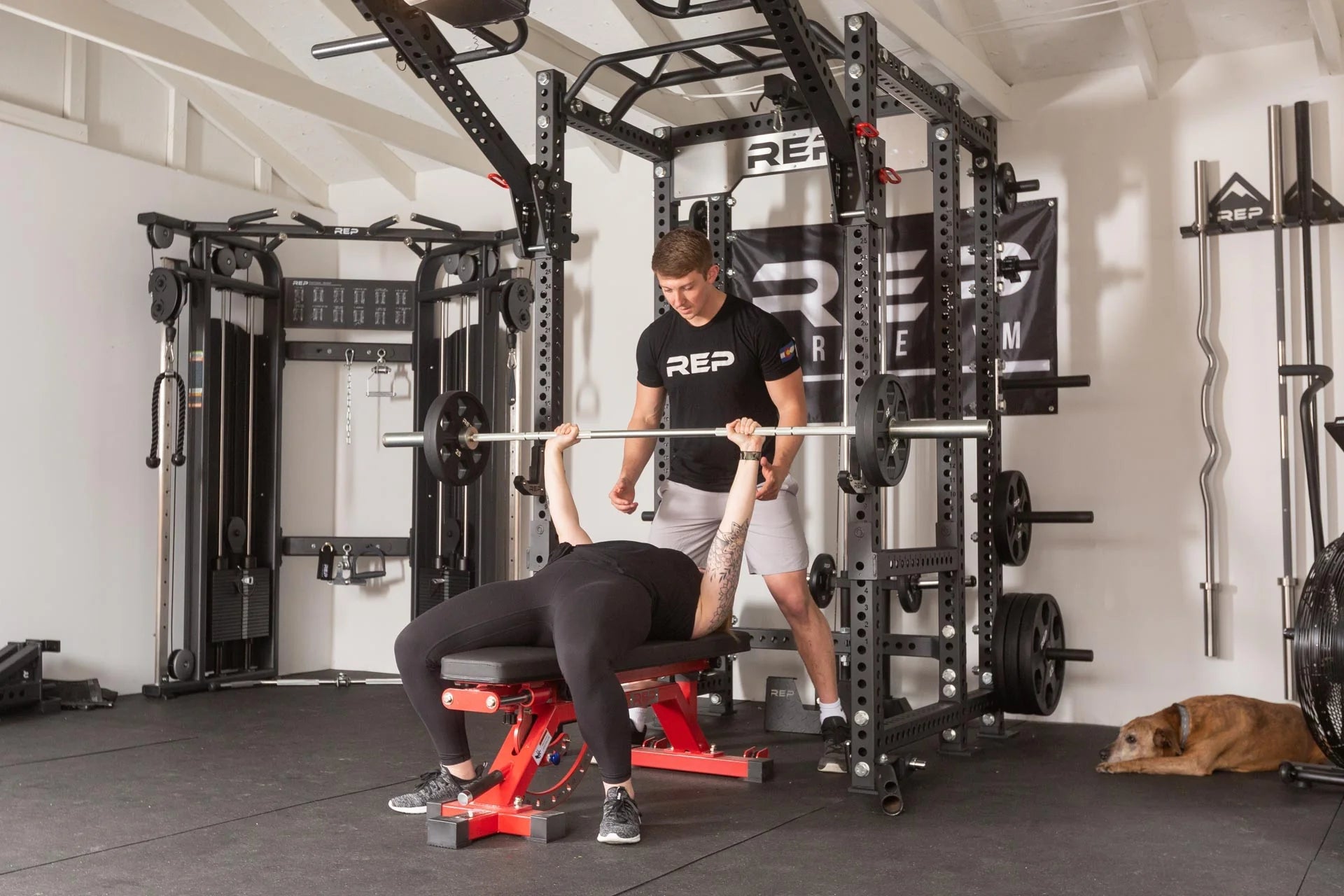 Athlete benching off the front of a PR-5000 rack in Matte Black