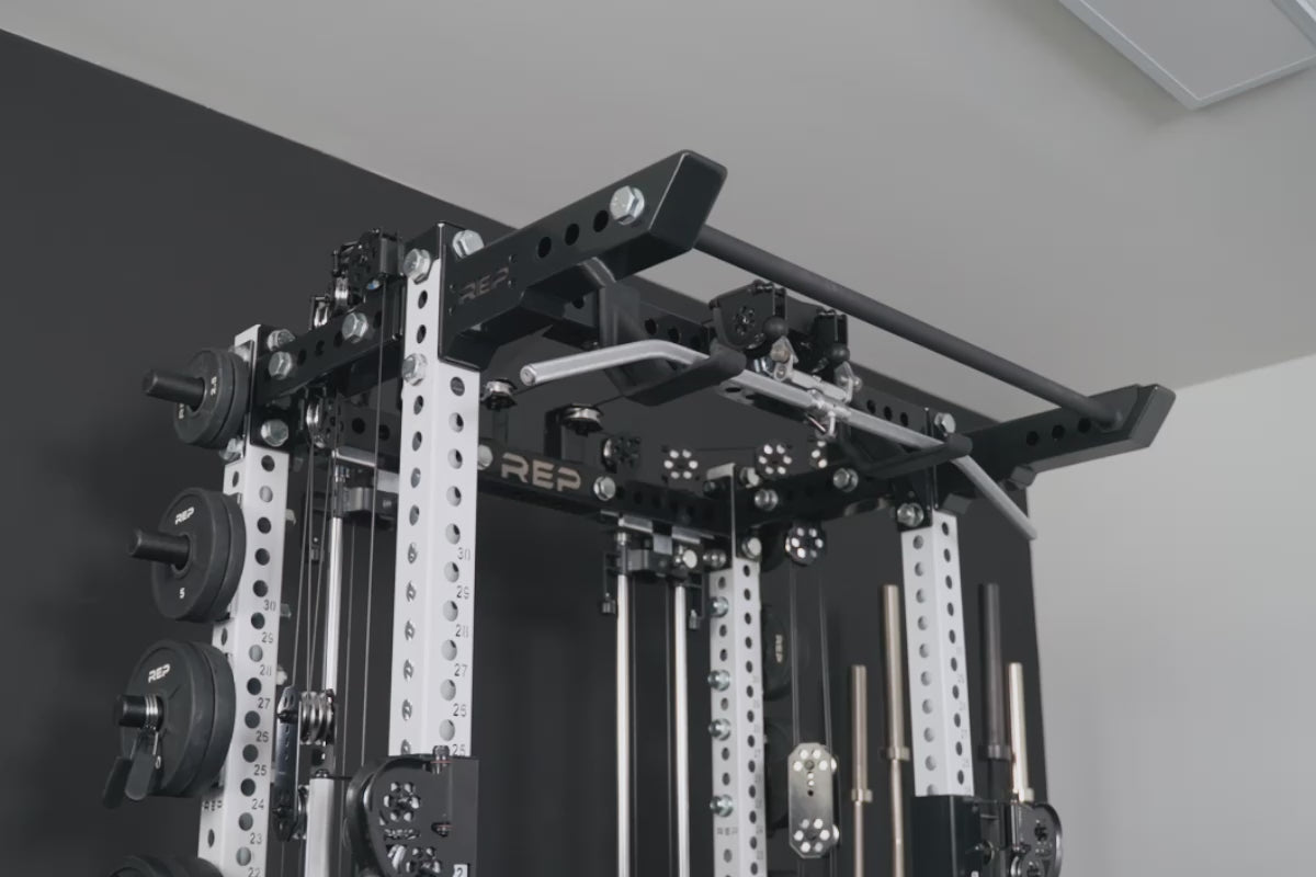 Pull-Up Bar Extension Brackets and Pull-Up Bar being used for pull-ups on the Ares 2.0 4-Post