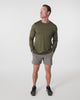 Athlete wearing the REP Fitness Men's Delta Long Sleeve Crew T-Shirt in Heather Black, Heather Cool Gray, Heather Olive
