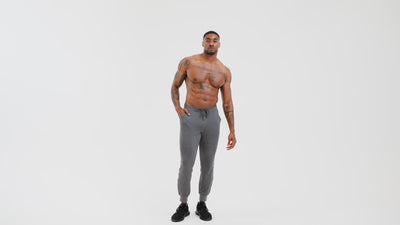 Video of an athlete doing standing quad stretches in the Grey Men's Attis Jogger