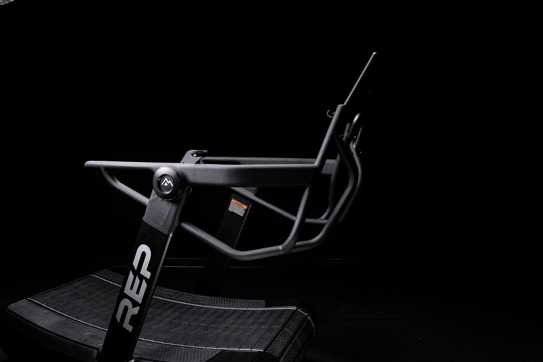 The ergonomic handle bars on the Strive Curved Treadmill