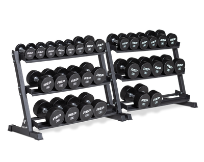 5-75lb Urethane Dumbbell Set stored on two REP Dumbbell Racks.