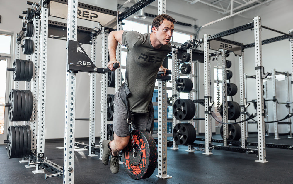 Drop-In Dip Attachment on PR-5000 Power Rack Being Used for Weighted Dips