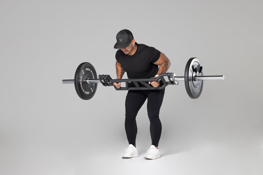 Lifter using loaded Cambered Swiss Bar for bent over rows.