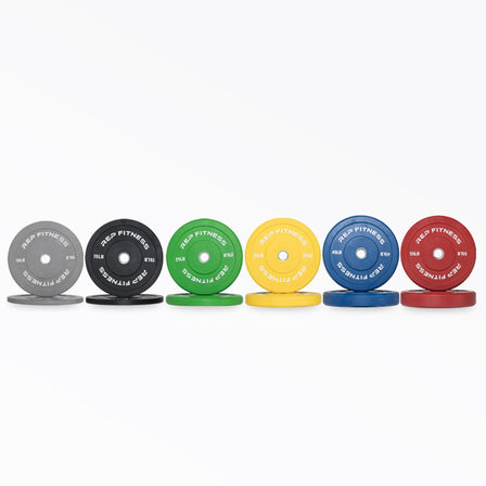 Full set of Color Bumper Plate Pairs: gray 10, black 15, green 25, yellow 35, blue 45, and red 55lb pairs.