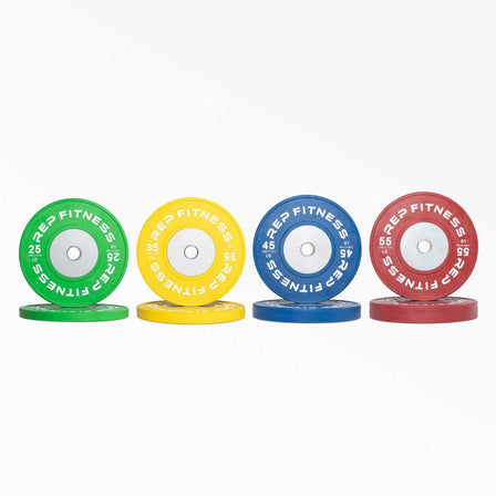 Set of Competition Bumper Plate (LB) Pairs: green 25, yellow 35, and blue 45lb pairs.