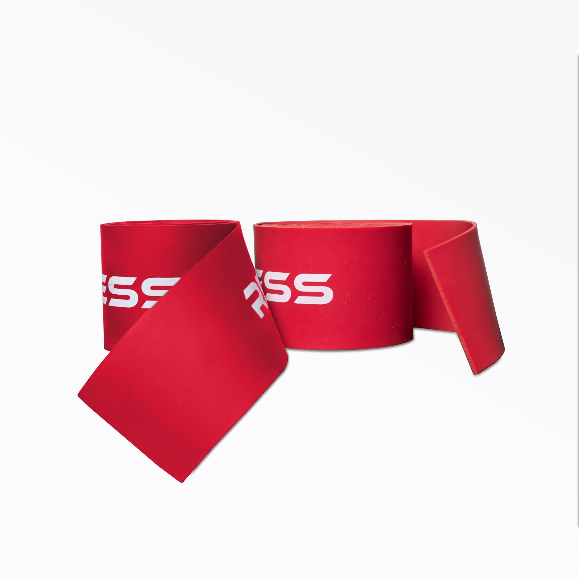 A pair of rolled up red REP Floss Bands.