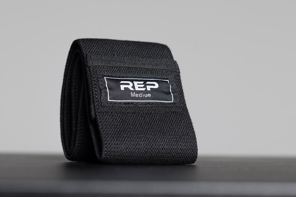 Black medium resistance REP circle hip band.