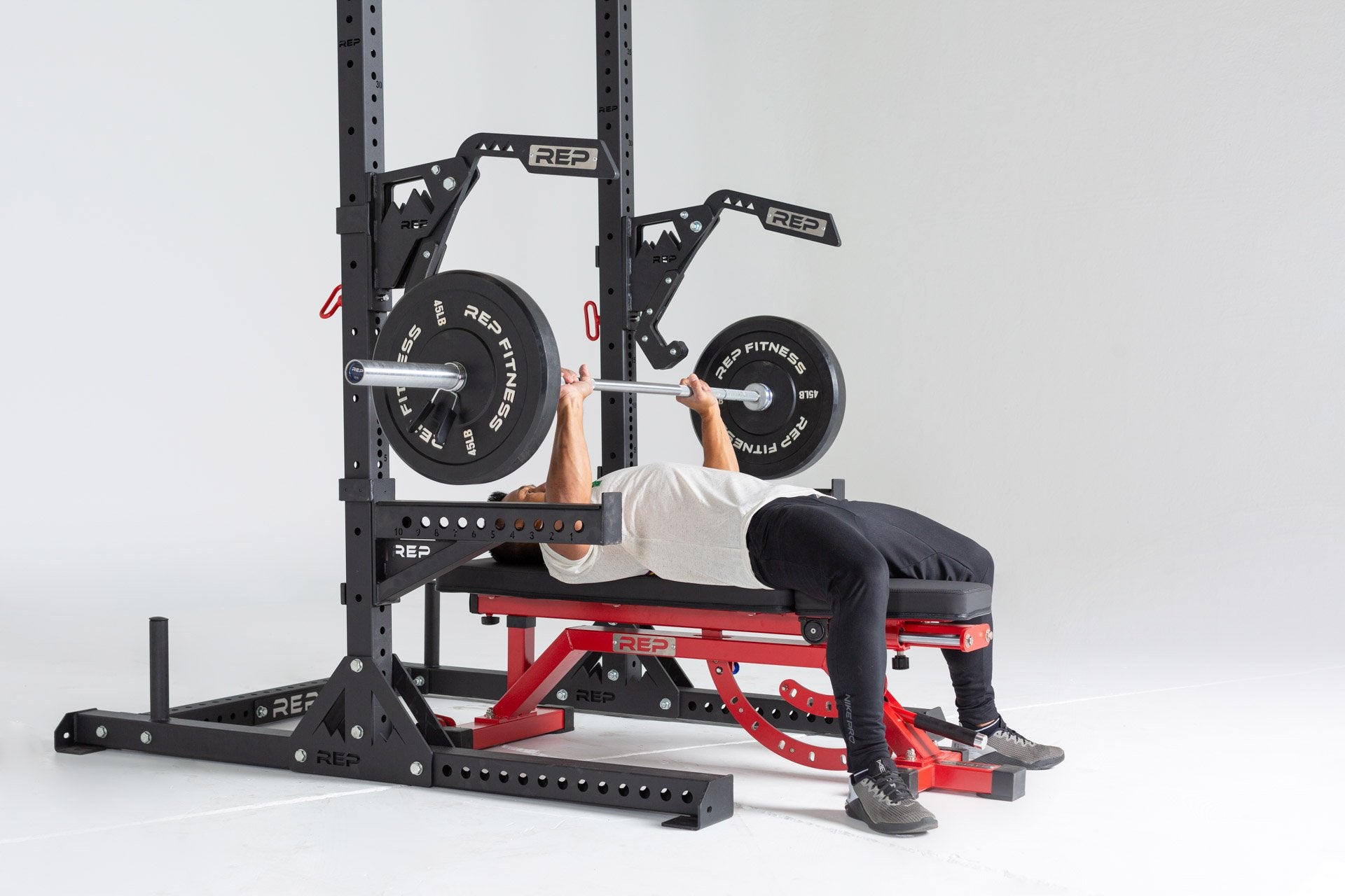 SR-4000 Squat Rack Shown With Spotter Arms and Monolift Arms (In Use - Bench Press)