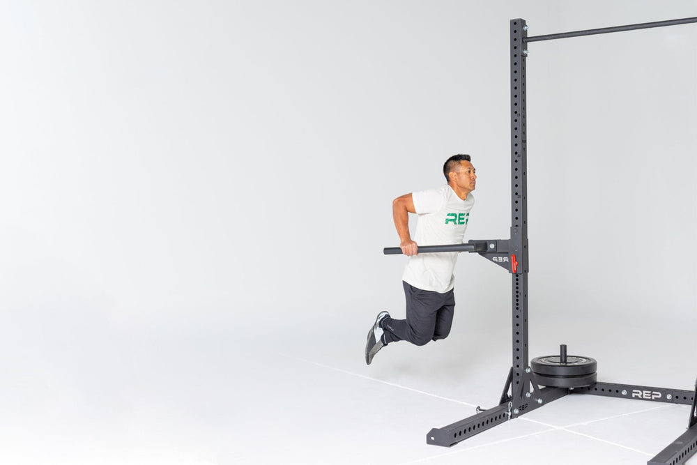 SR-4000 Squat Rack Shown With Dip Station (In Use - Dips)