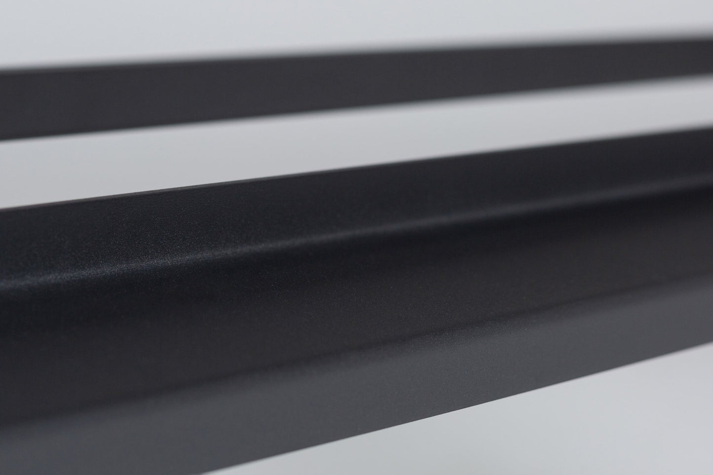 Close-up view of a REP Dumbbell Rack shelf.