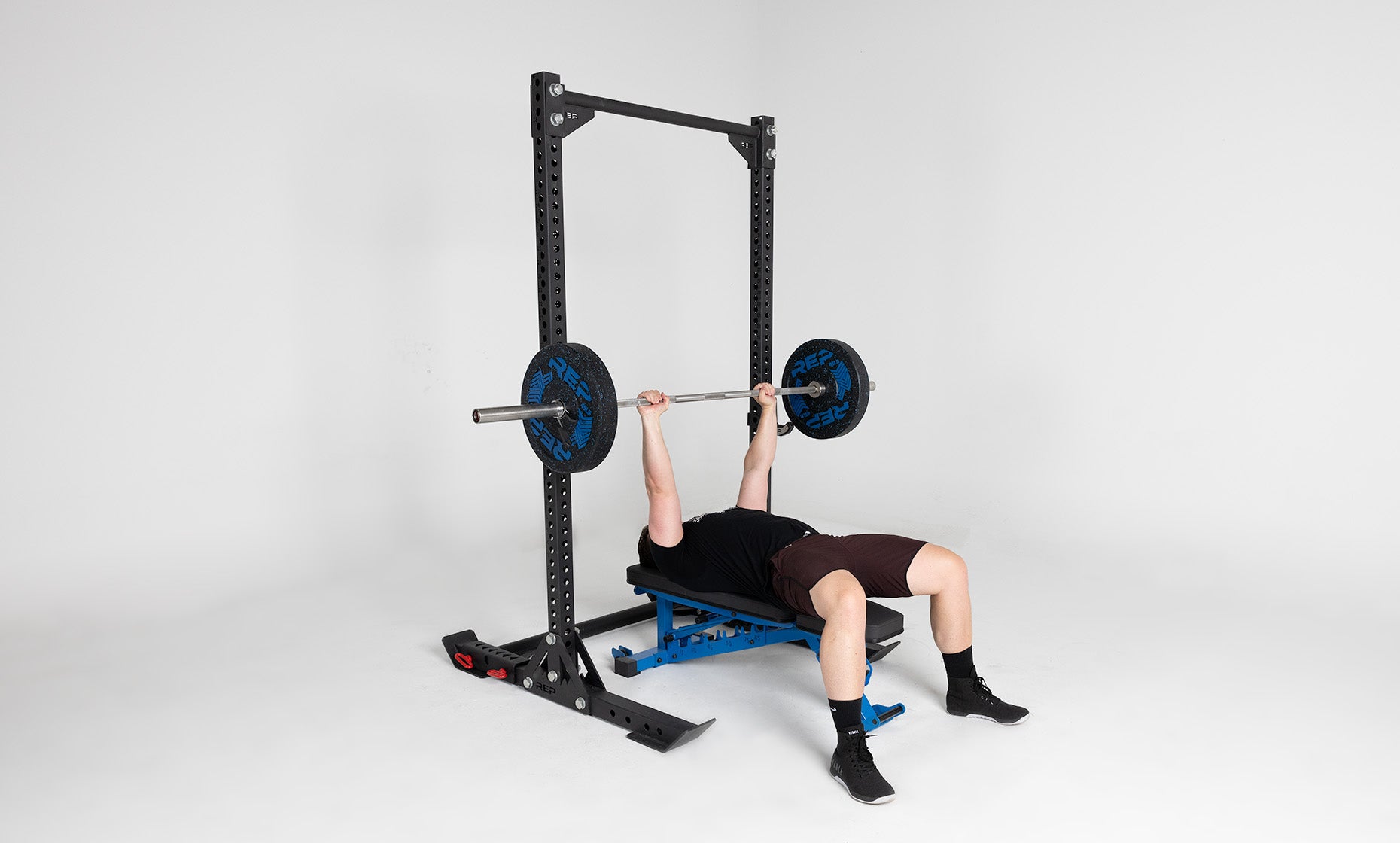 Oxylus Yoke With Pull-Up Bar Being Used For Bench Press